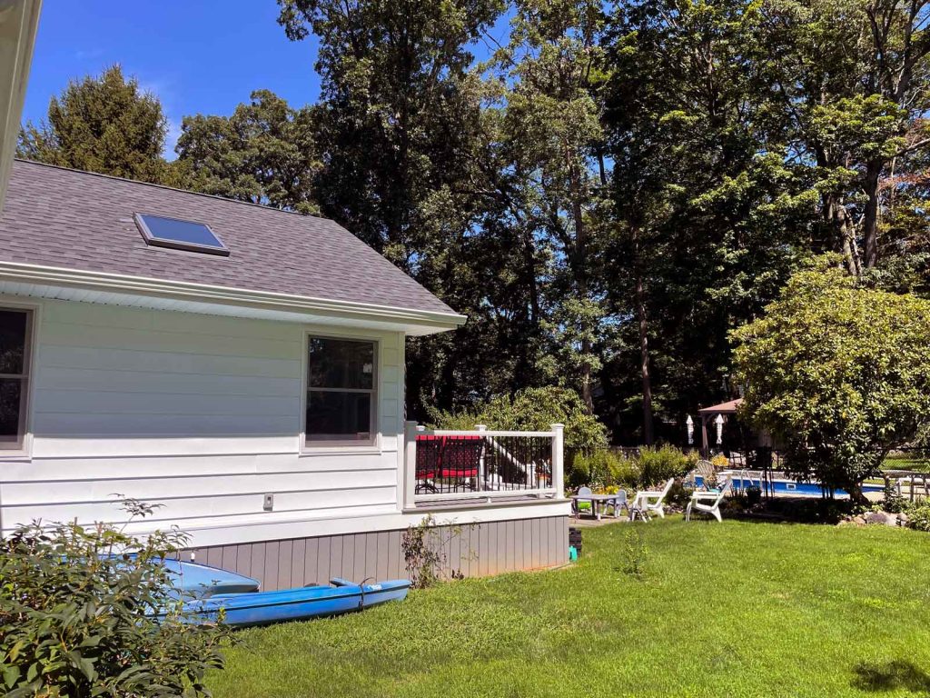 Side view of a home addition in Ringwood NJ by White Maple Construction