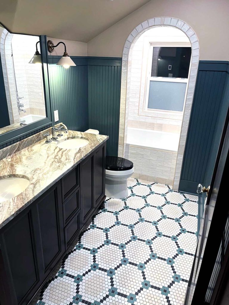 Detailed tile work in a bathroom renovation by White Maple Construction