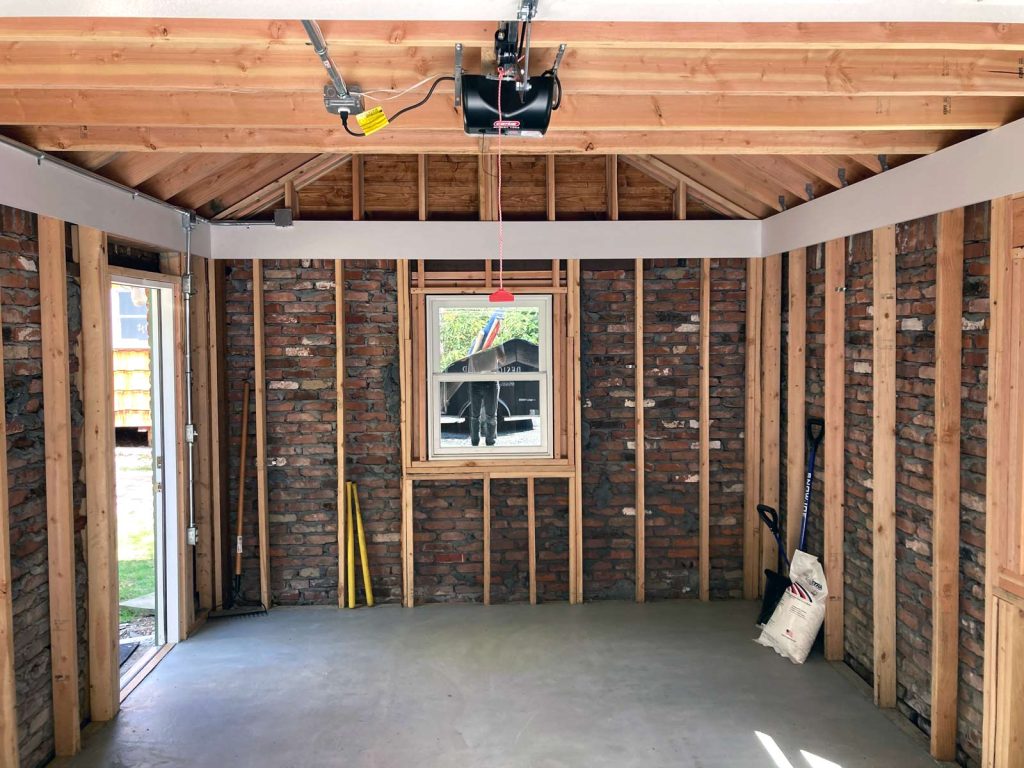 The interior of a recently renovated detached garage by White Maple Construction